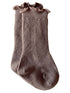 Brown ribbed socks with a ruffled top, designed for comfort and style.