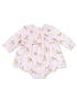 Pink dress with animal prints, featuring long sleeves and a smocked bodice, suitable for infants.
