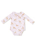 Baby onesie with a light pink background and cute animal prints, featuring deer and other woodland creatures.