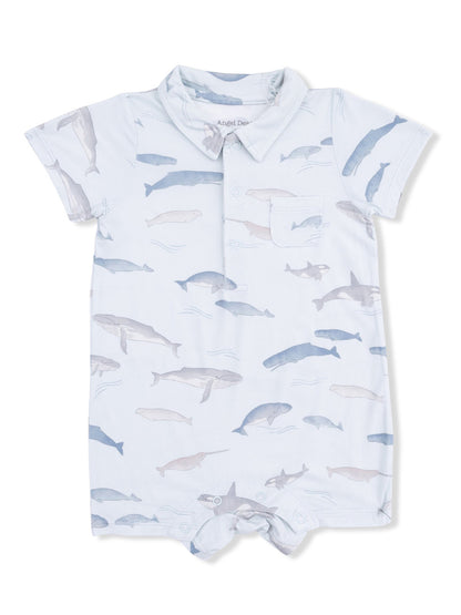 Light blue romper with whale patterns, featuring a collar and buttons, perfect for infants or toddlers.