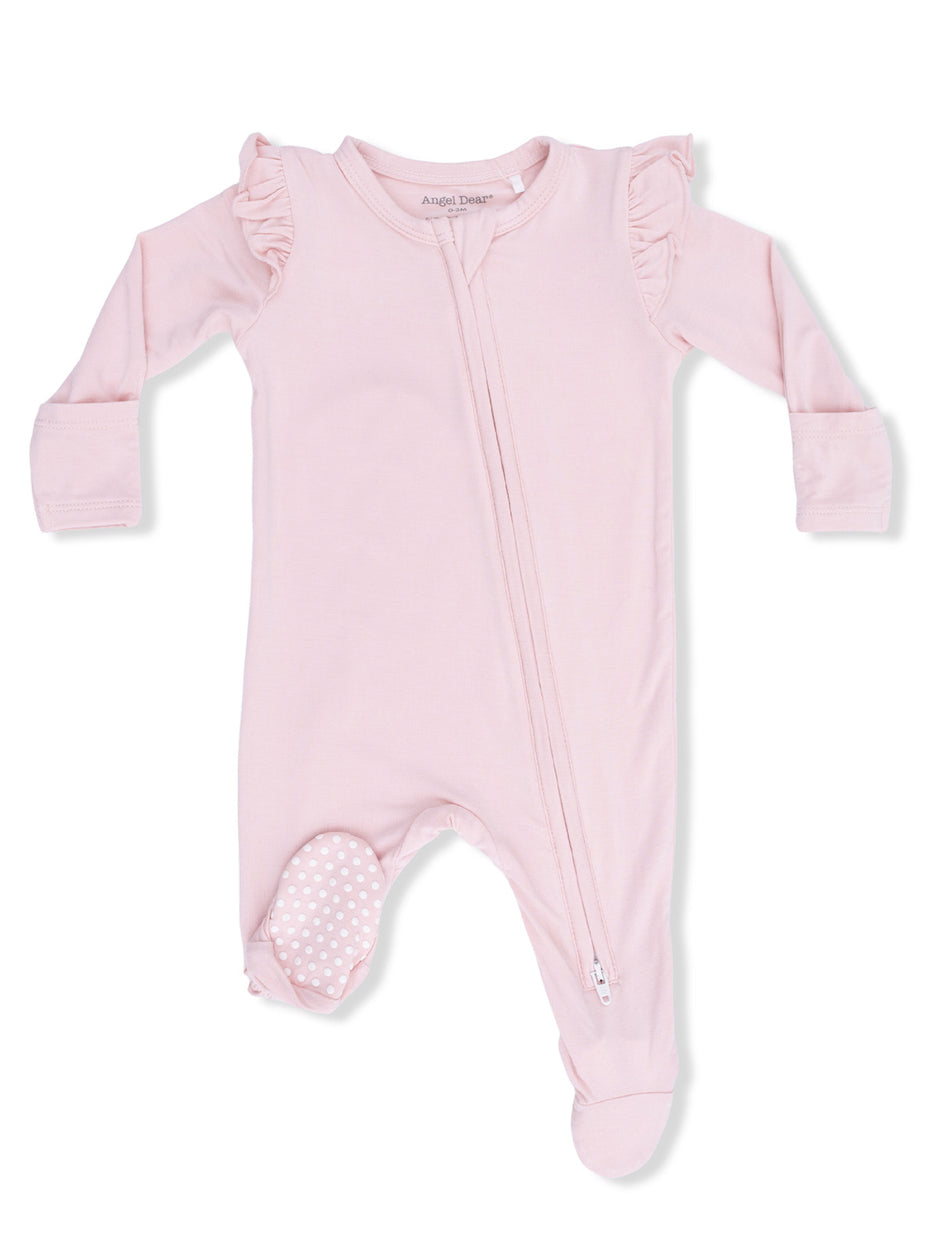 Pink infant romper with ruffle details and a front zipper for easy dressing, featuring polka-dot foot grips.