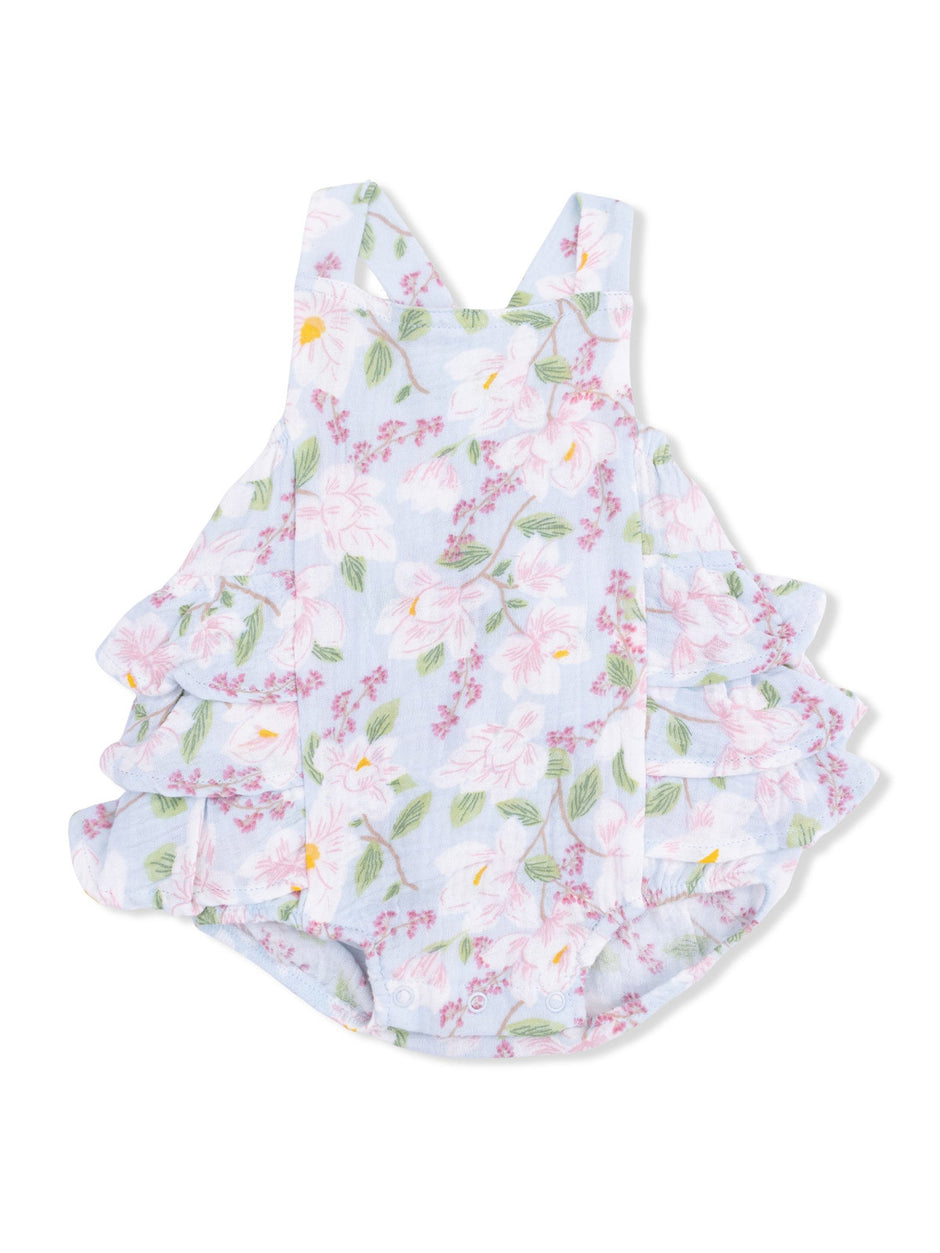 Floral ruffled toddler romper in light blue with pink and green accents, perfect for warm weather.