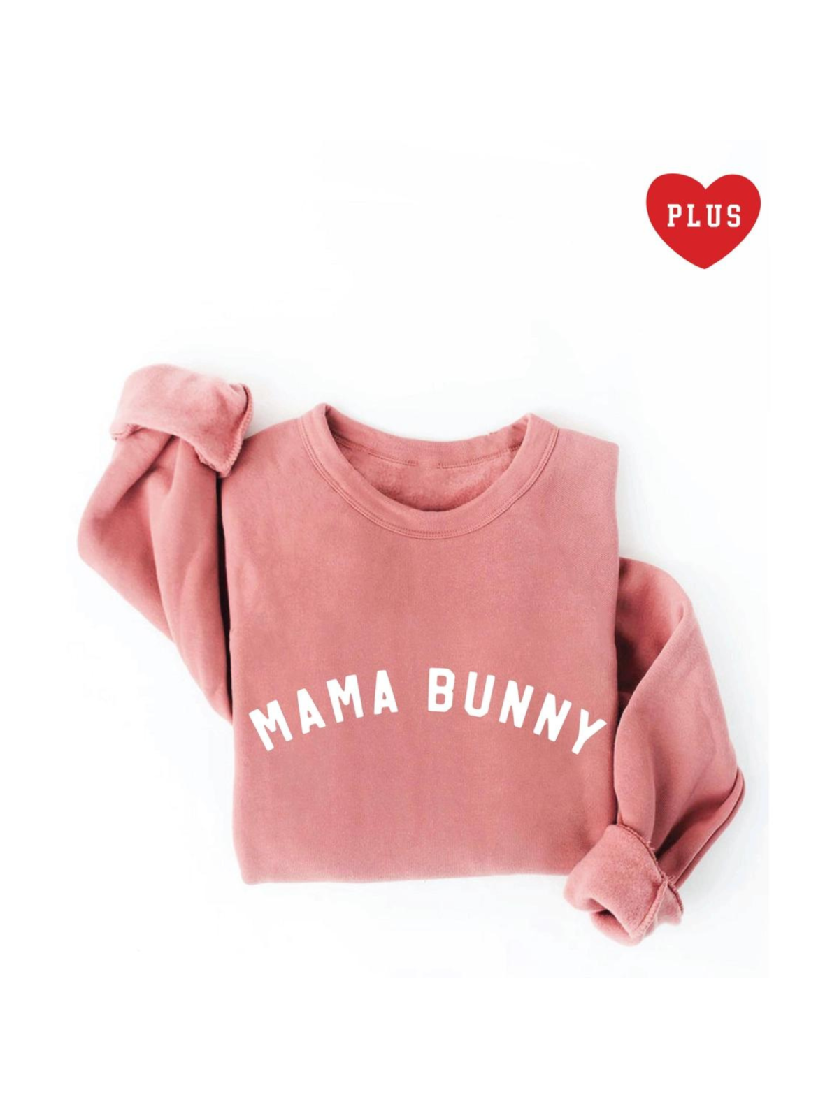 Plus size pink sweatshirt with "MAMA BUNNY" text displayed prominently. Soft, cozy fabric and relaxed fit.
