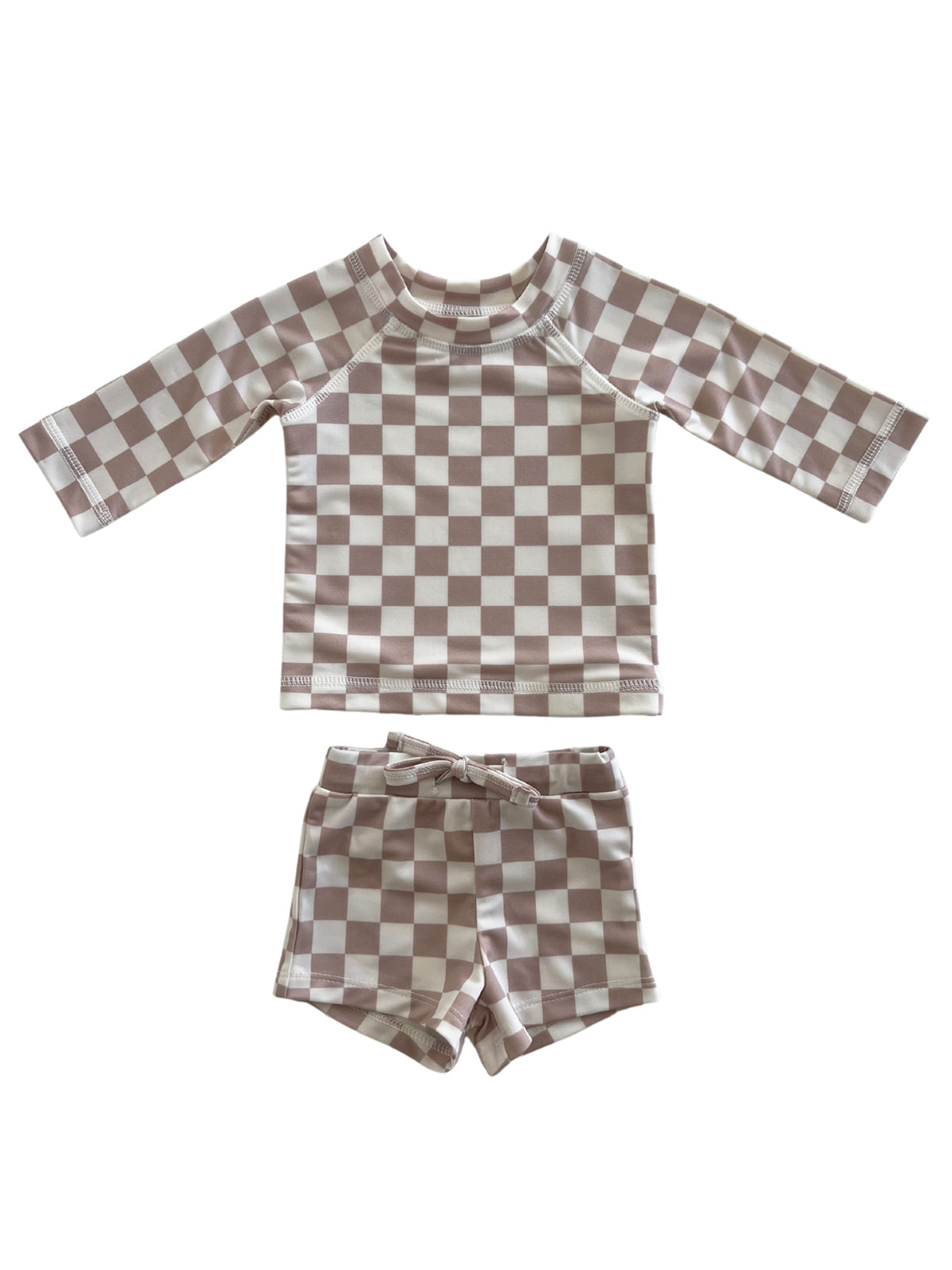 Kids' swimwear set featuring a long-sleeve top and shorts with a checkered pattern in beige and white.