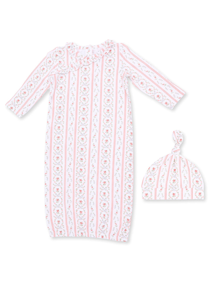 Floral baby gown and matching hat set with pink stripes and ruffle details, perfect for newborns.
