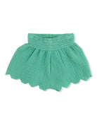 Green scalloped hem skirt with elastic waistband, made from lightweight fabric. Perfect for casual wear.