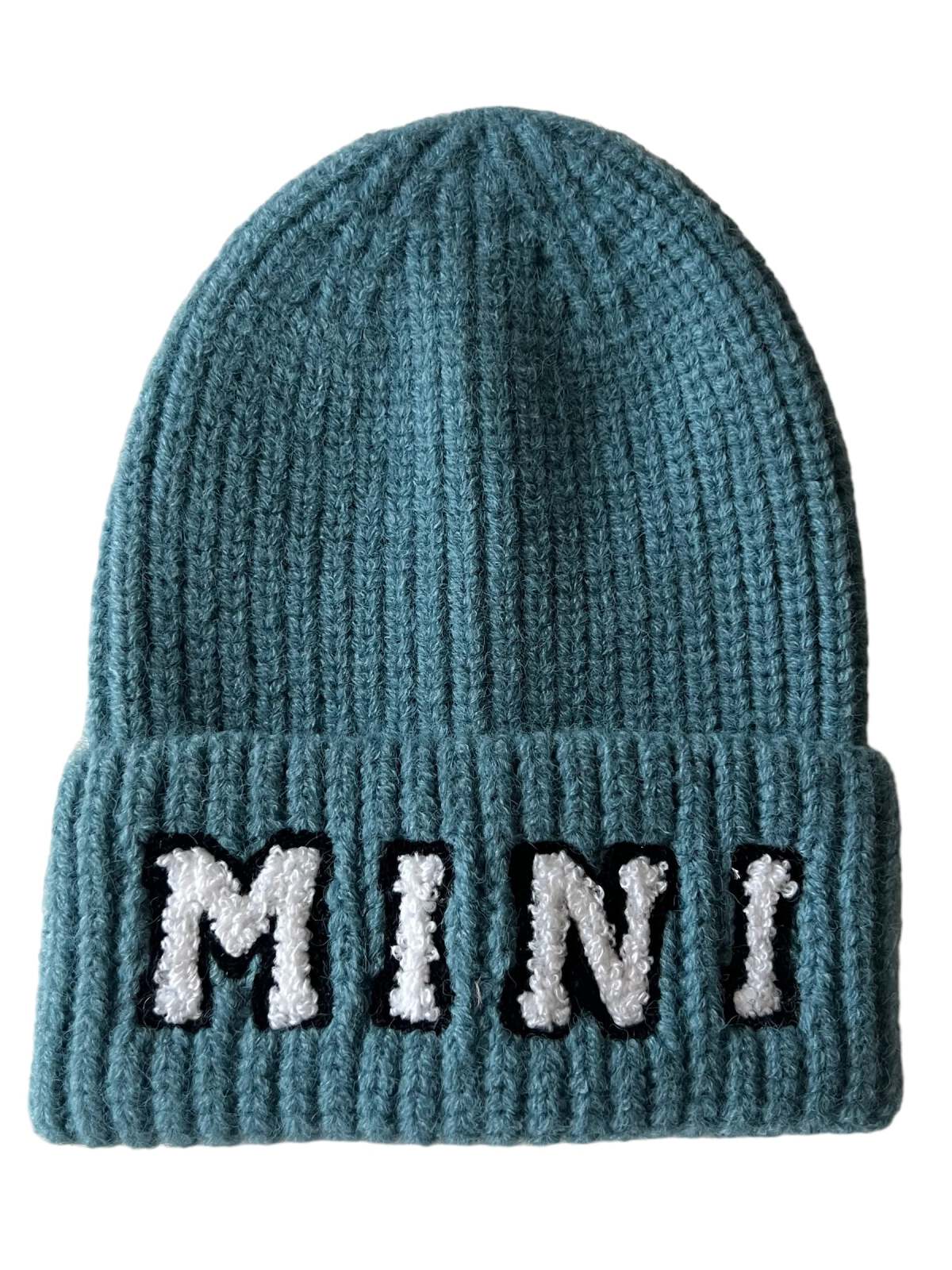 Teal knitted beanie with "MINI" embroidered in white on a black background.