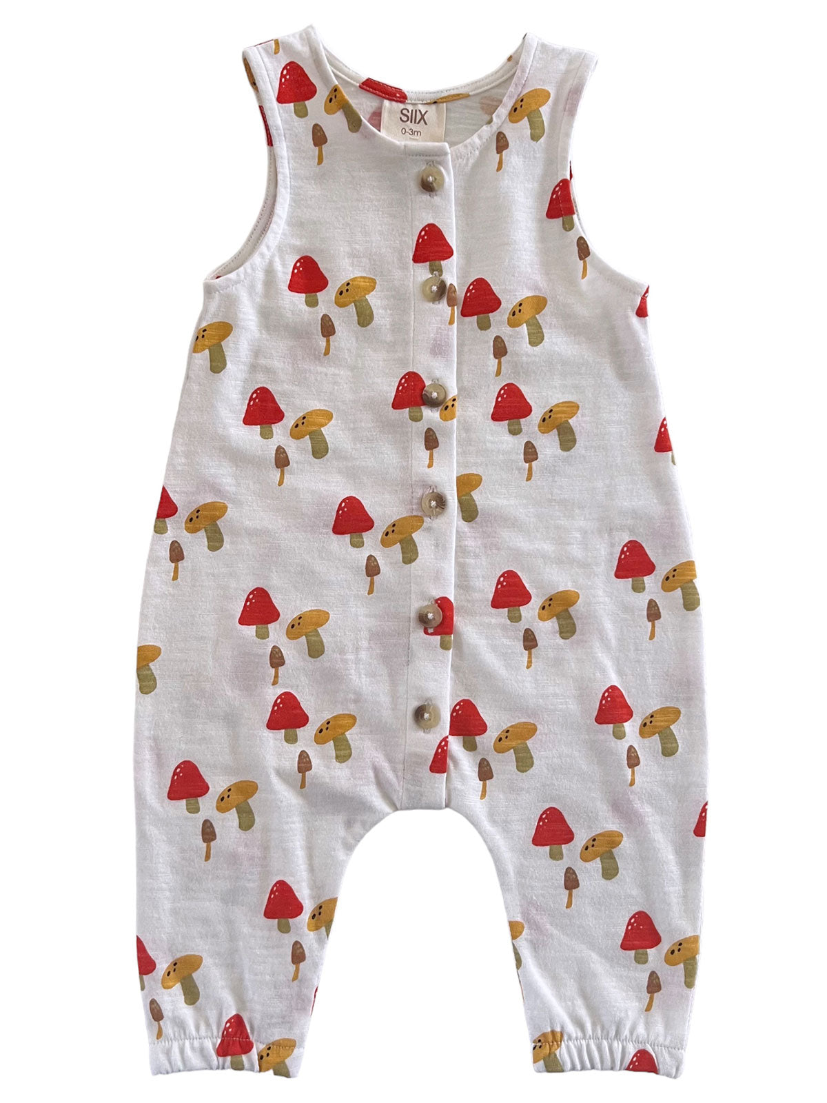 White infant romper with colorful mushroom print, featuring buttons down the front and sleeveless design.
