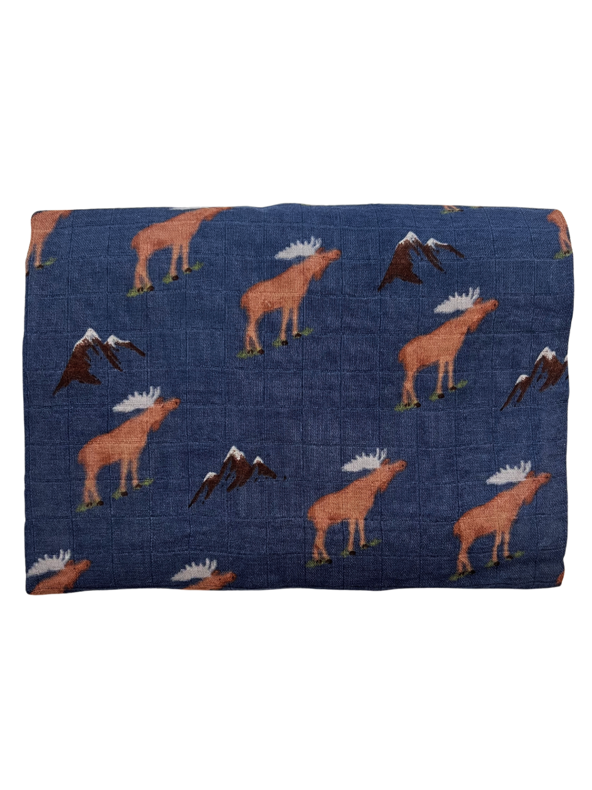 Moose-patterned fabric with mountains on a dark blue background, folded neatly.