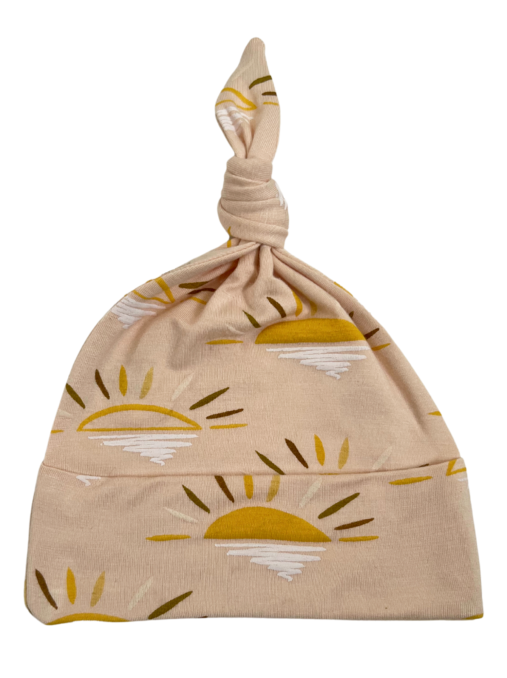 Light pink baby hat with sun and rays pattern, featuring a knot at the top for a cute, playful look.