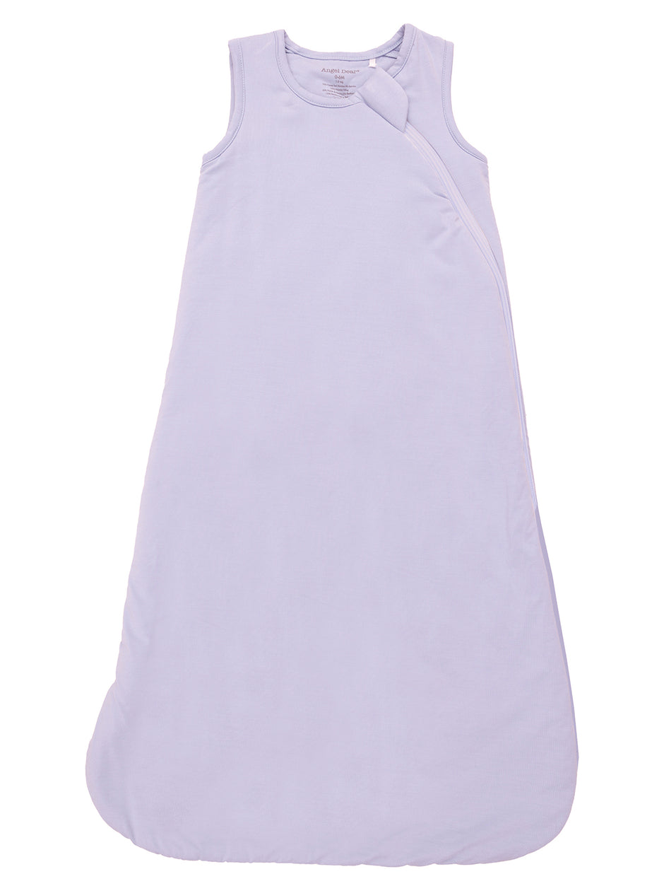 Light purple baby sleep sack with shoulder snaps, designed for comfort and safety during sleep.