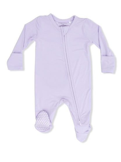 Light purple baby onesie with long sleeves and a front zipper, featuring polka-dotted foot grips.