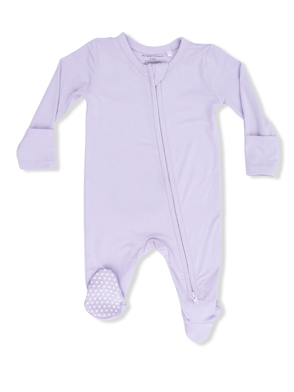 Light purple baby onesie with long sleeves and a front zipper, featuring polka-dotted foot grips.