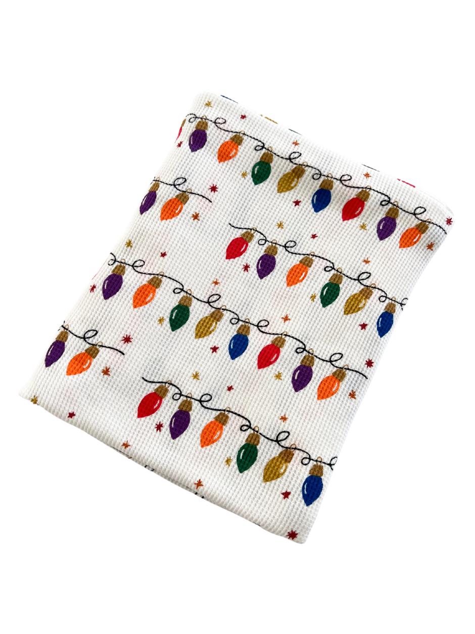 files/organic-cotton-waffle-swaddle-christmas-lights-1.png