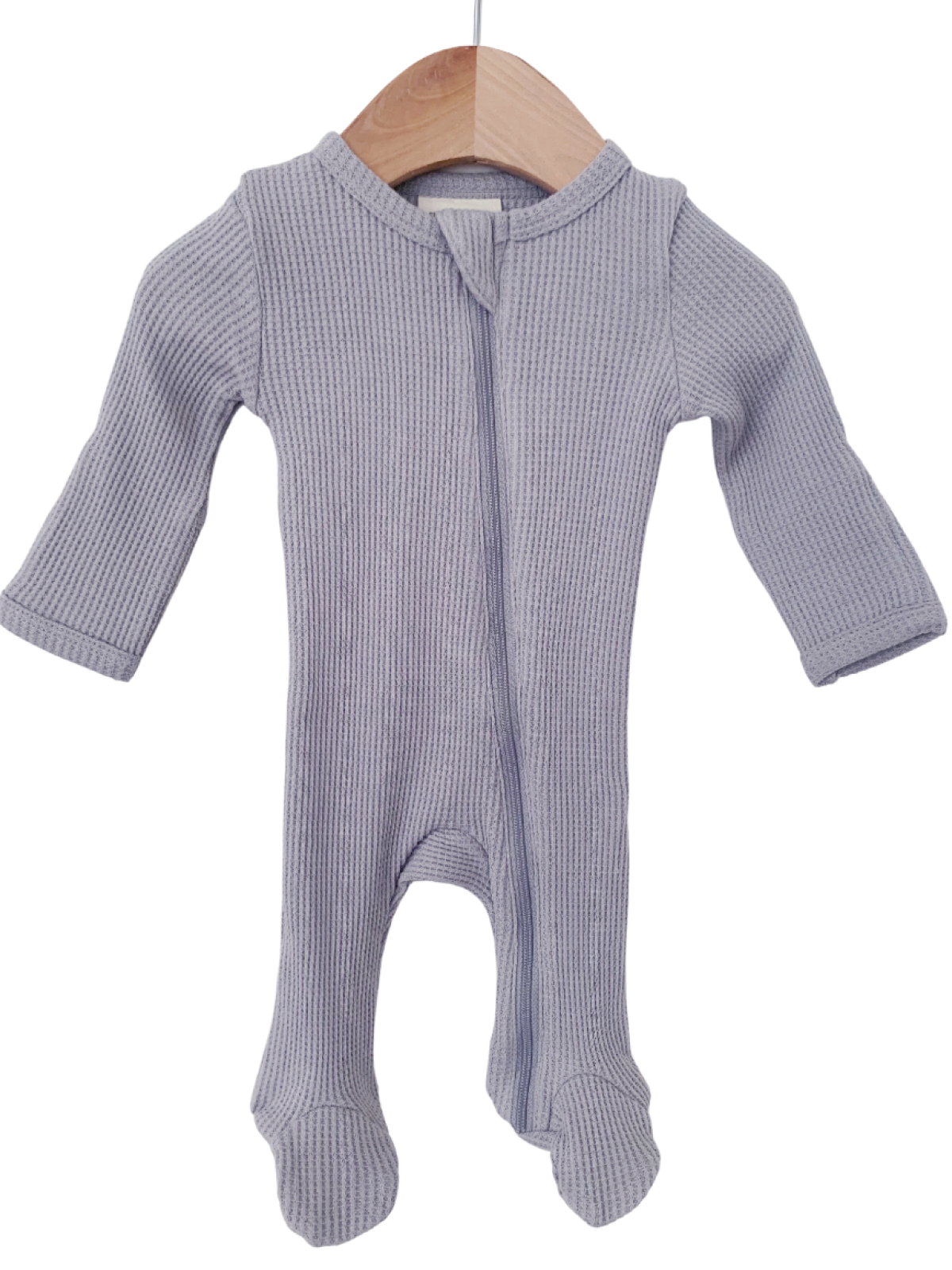 Light gray ribbed baby onesie hanging on a wooden hanger.