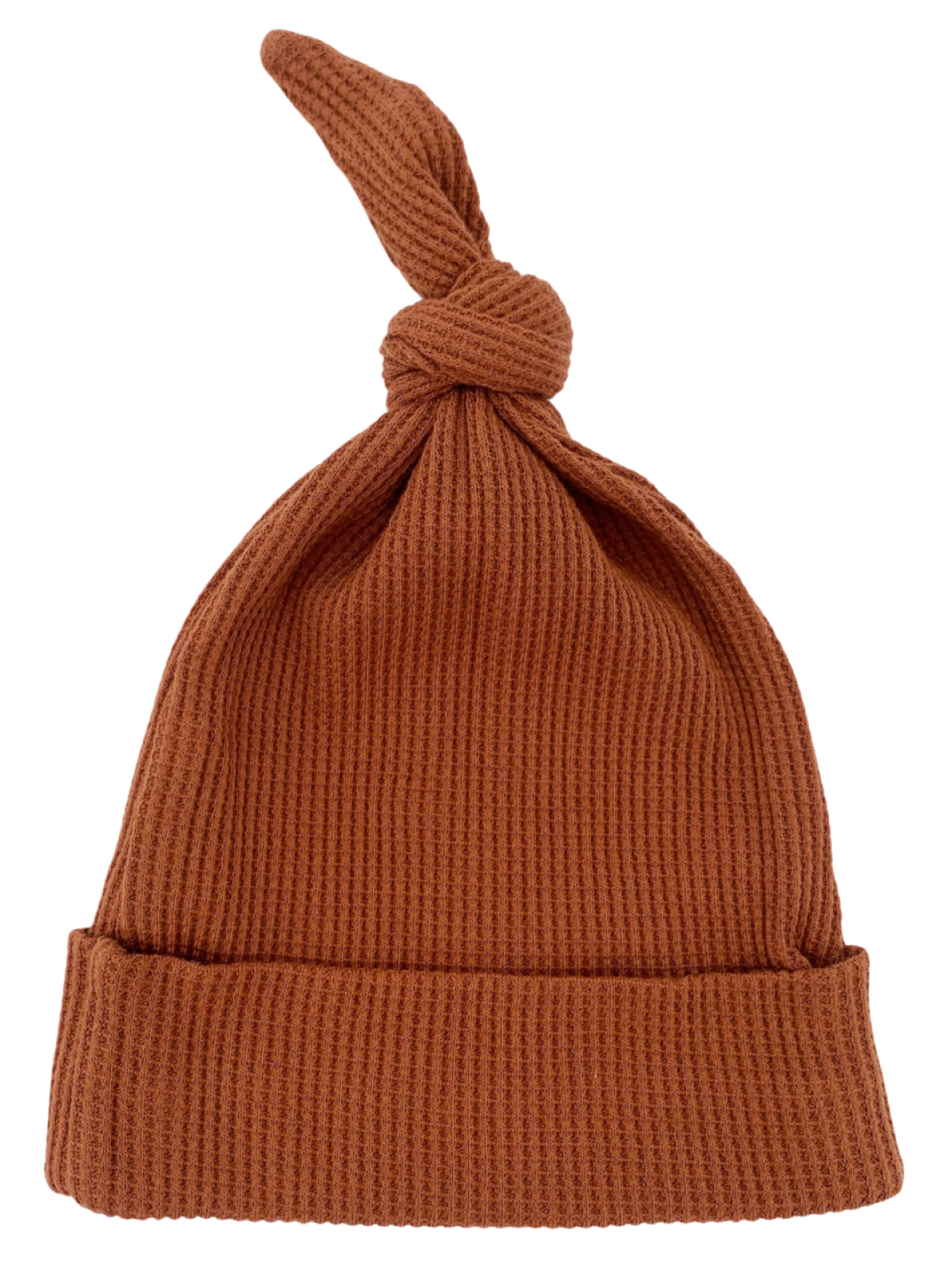 Knitted brown baby hat with a folded brim and a knotted top.