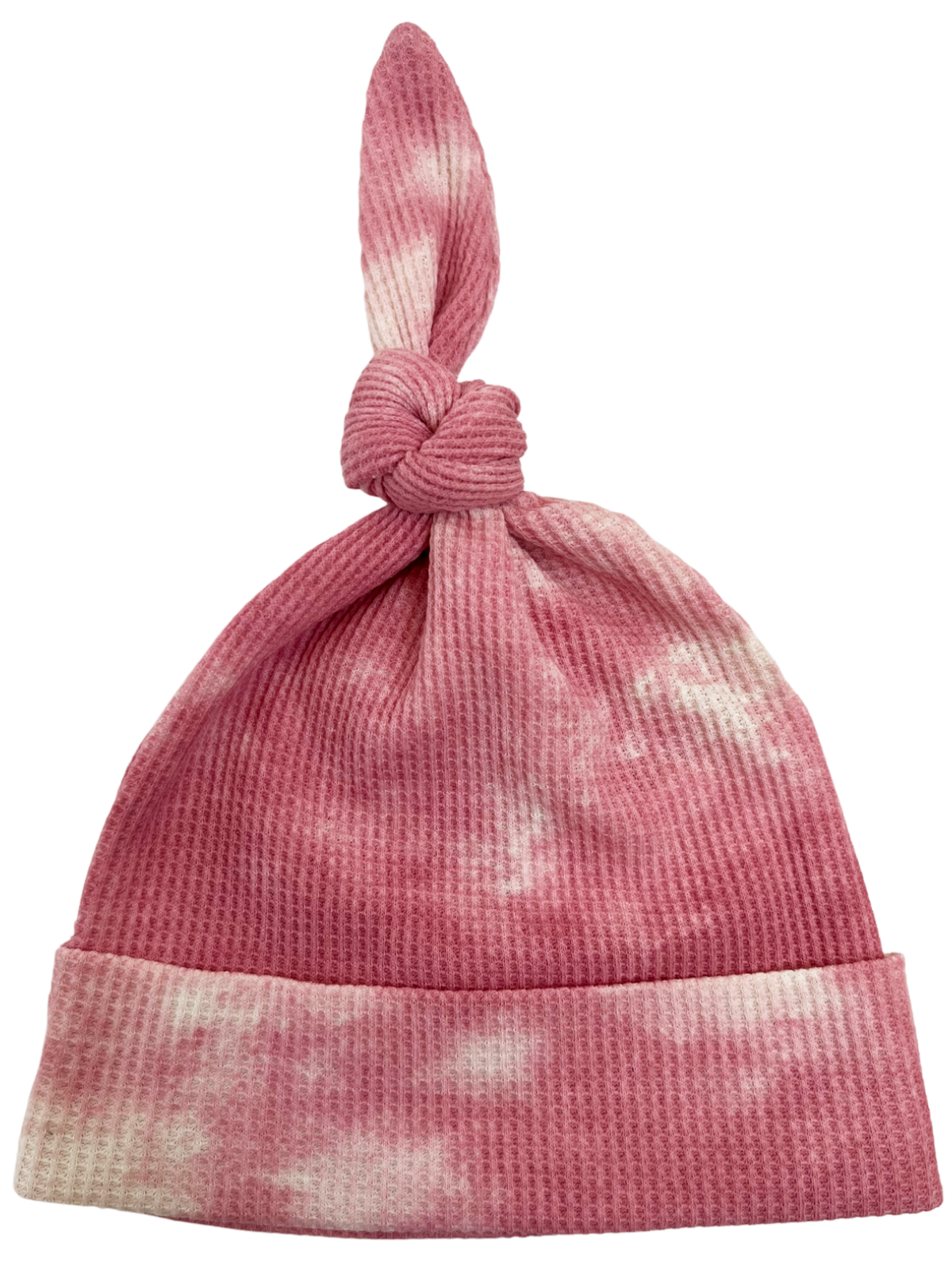 Pink tie-dye knit hat with a knotted top and a folded brim. Perfect for adding style and warmth.