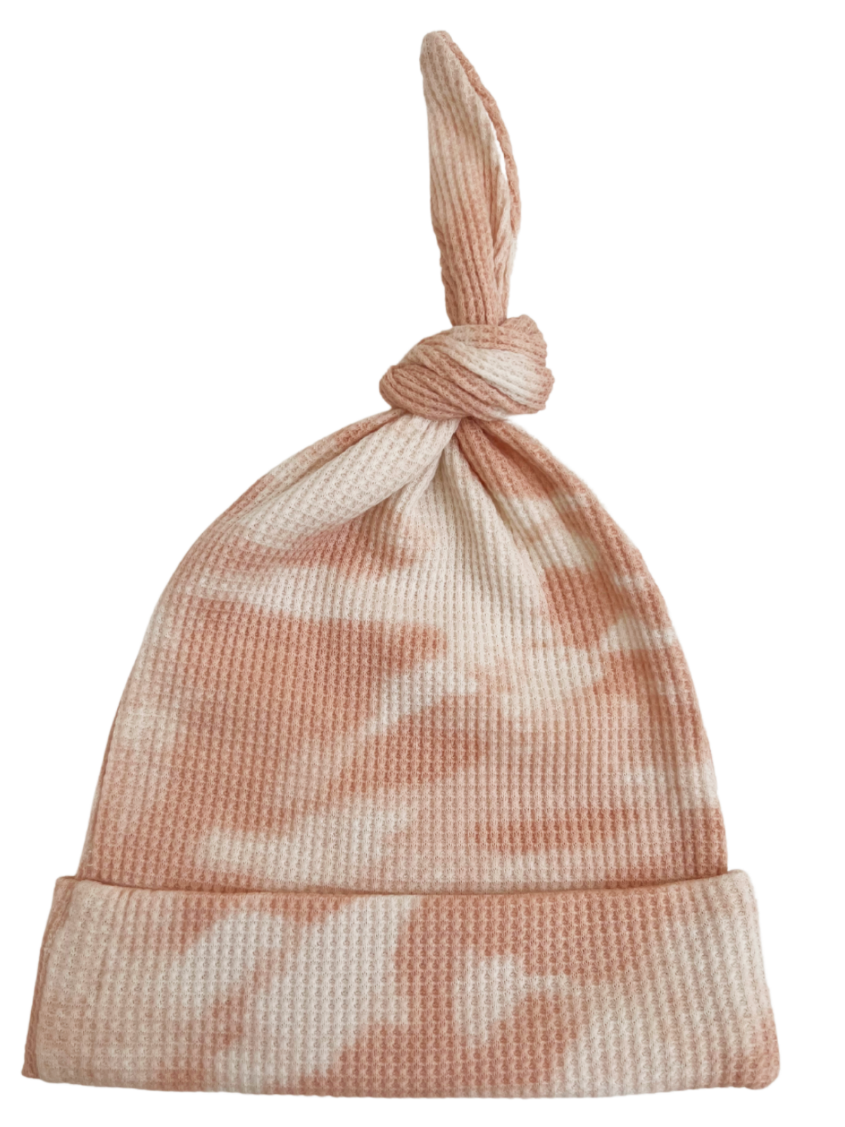 Peach-and-white tie-knotted hat with ribbed texture and cuffed brim.