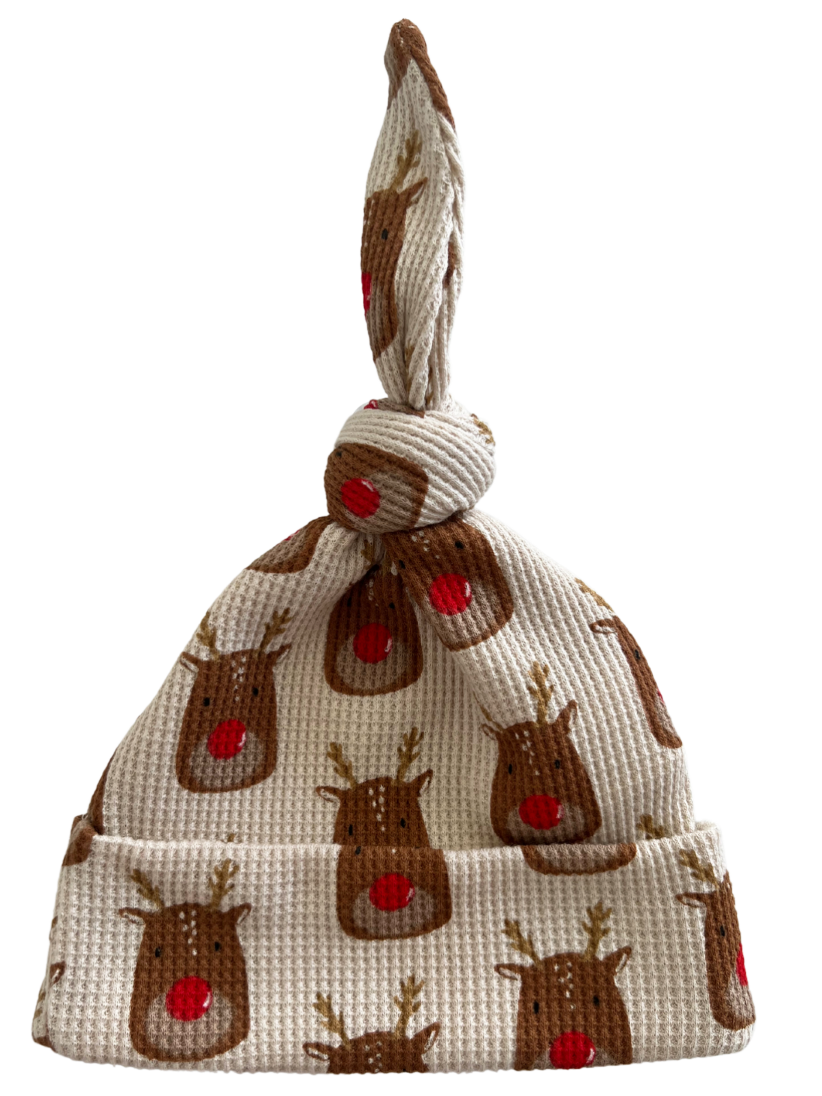 Knotted baby hat with a reindeer design, featuring a soft texture and festive colors.