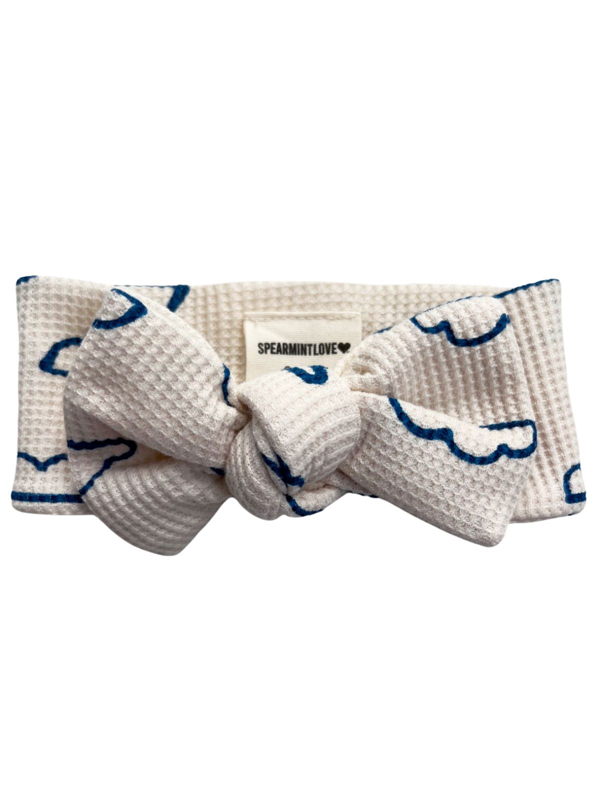 White textured headband with blue cloud design and a knot detail, featuring a "SPEARMINTLOVE" label.