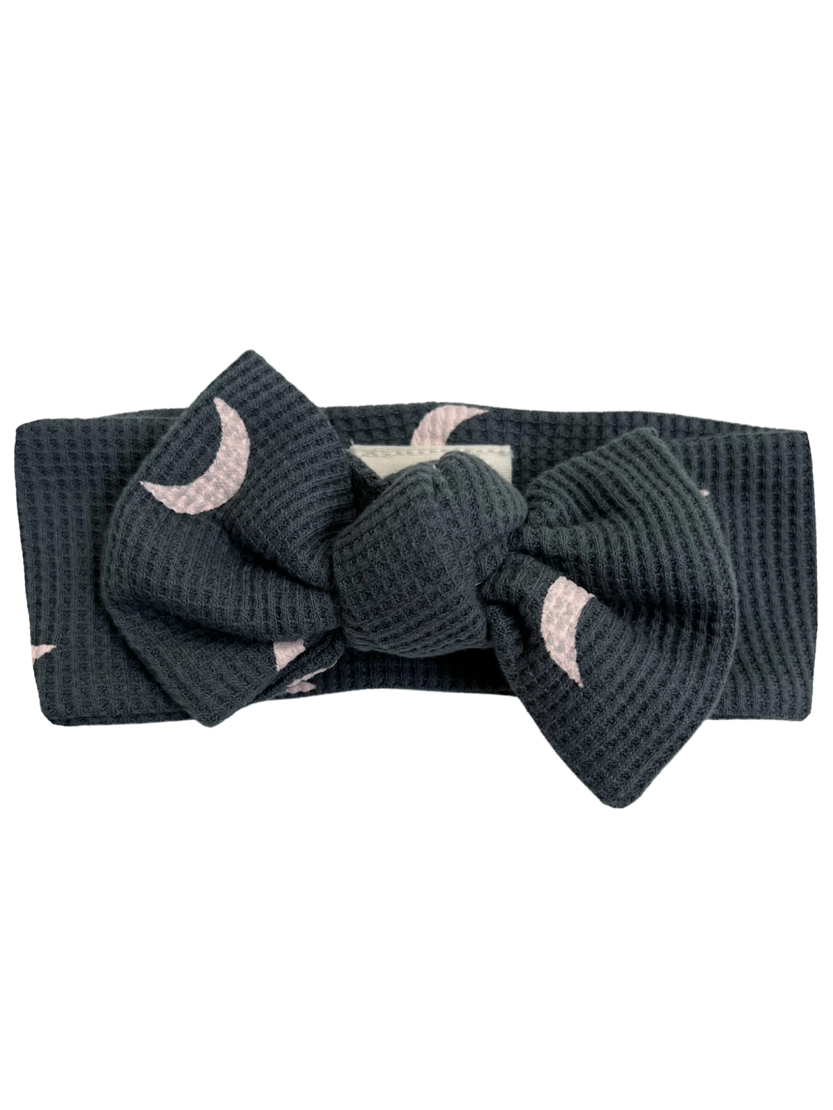 Dark gray headband with a pink moon pattern and a large bow in the center.