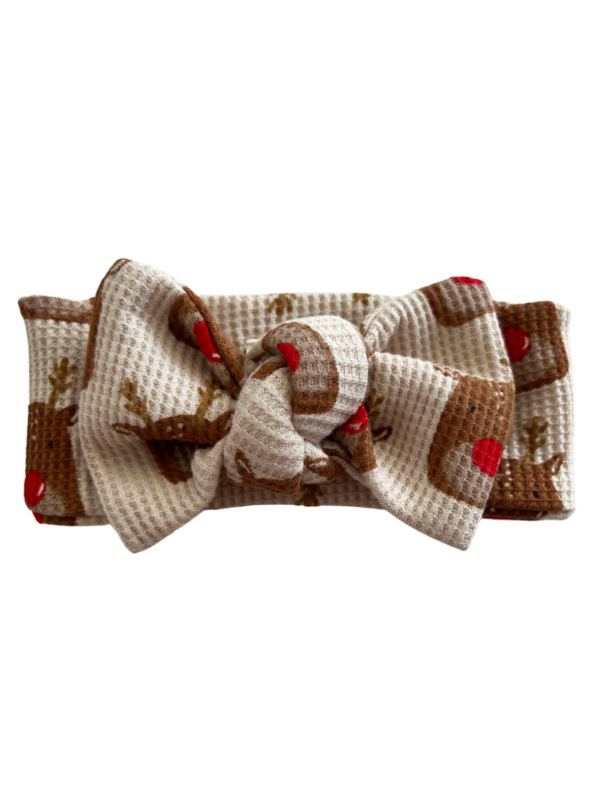 Reindeer-patterned hair bow with a cute knot, perfect for holiday outfits.
