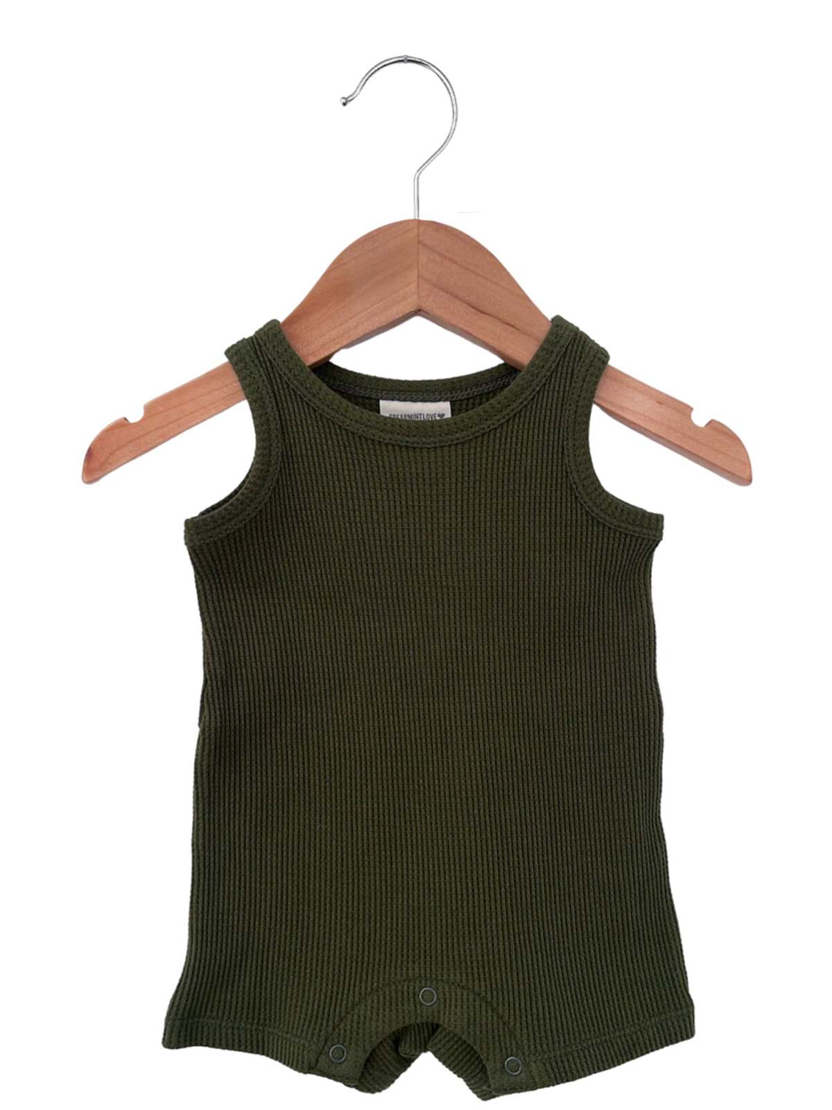 Olive green ribbed sleeveless onesie hanging on a wooden hanger.