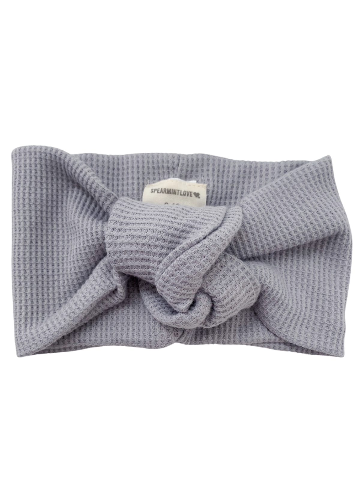 Gray knit headband with a knotted design and a label reading "SPEARMINT LOVE".