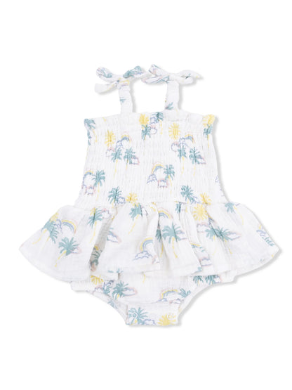 White dress with pastel palm tree and rainbow pattern, featuring straps and a flared skirt for toddlers.