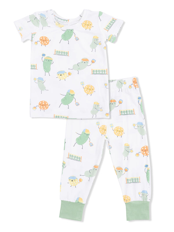 Children’s pajamas featuring playful colorful birds and treats on a white background with green accents.
