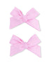 Two pink fabric hair bows with a knotted center, perfect for children's hairstyles.