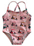 Pink swimsuit with golf cart pattern, featuring adjustable straps and snap closure. Ideal for summer activities.