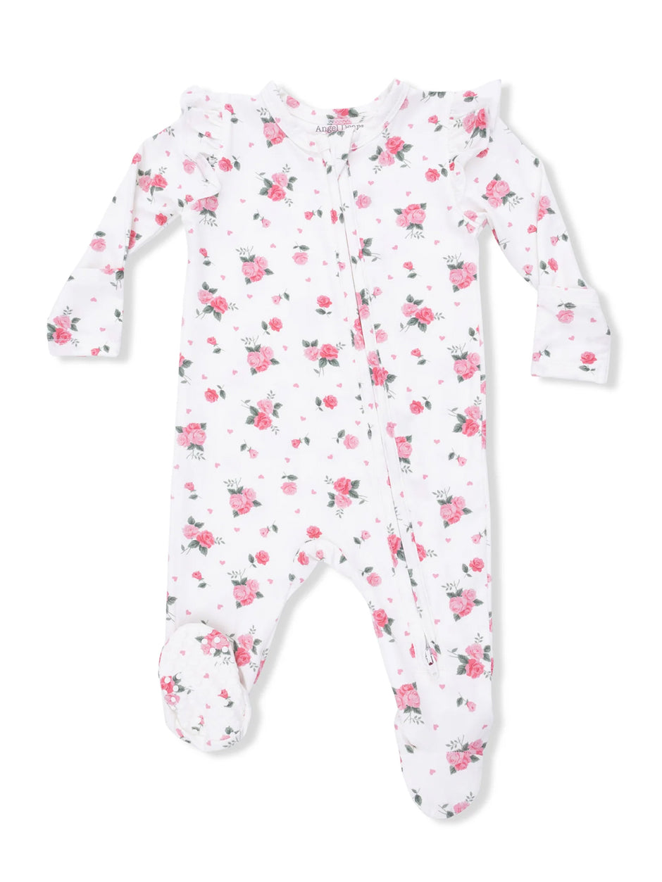 White floral baby onesie with pink roses and ruffles, featuring a front zipper and footed design.