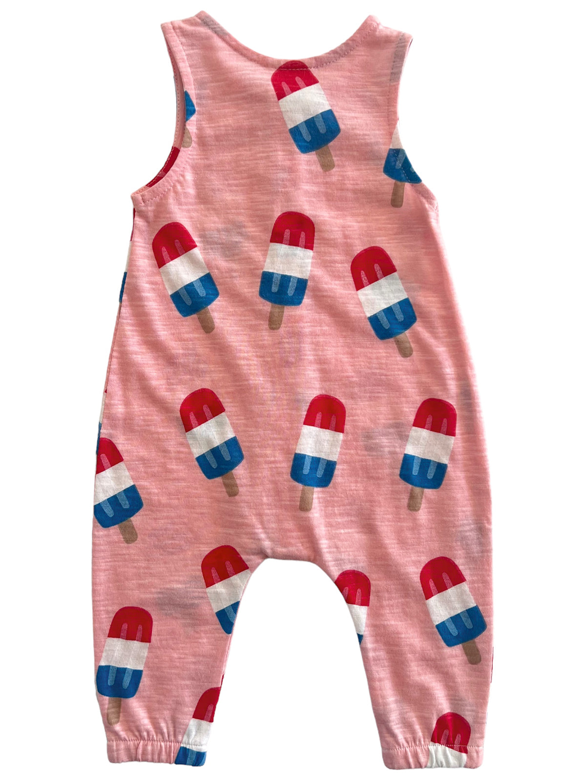 Child's sleeveless jumpsuit in pink with colorful popsicle prints. Soft fabric, relaxed fit. Ideal for warm weather.