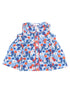 Floral patterned sleeveless children's top in blue, orange, and red with a button front and Peter Pan collar.