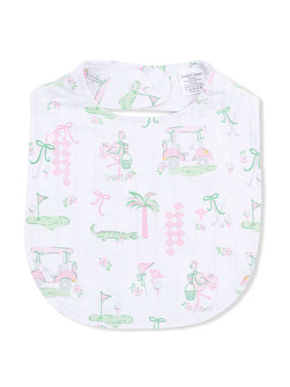 White bib featuring a playful print of golf-themed icons, flowers, and palm trees in pastel colors.
