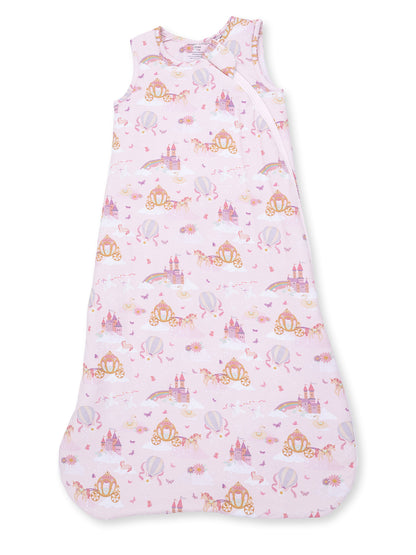 Pink baby sleep sack with whimsical princess-themed print, featuring castles, unicorns, and balloons.
