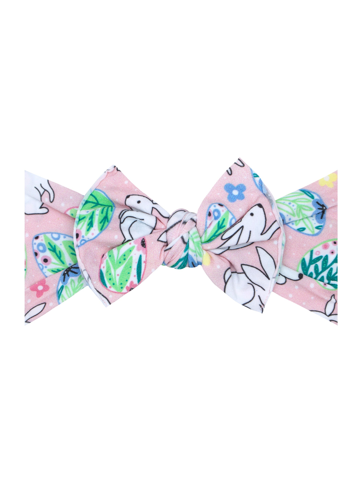 Bunny and egg pattern hair bow on a pink background. Ideal for festive occasions or everyday wear.