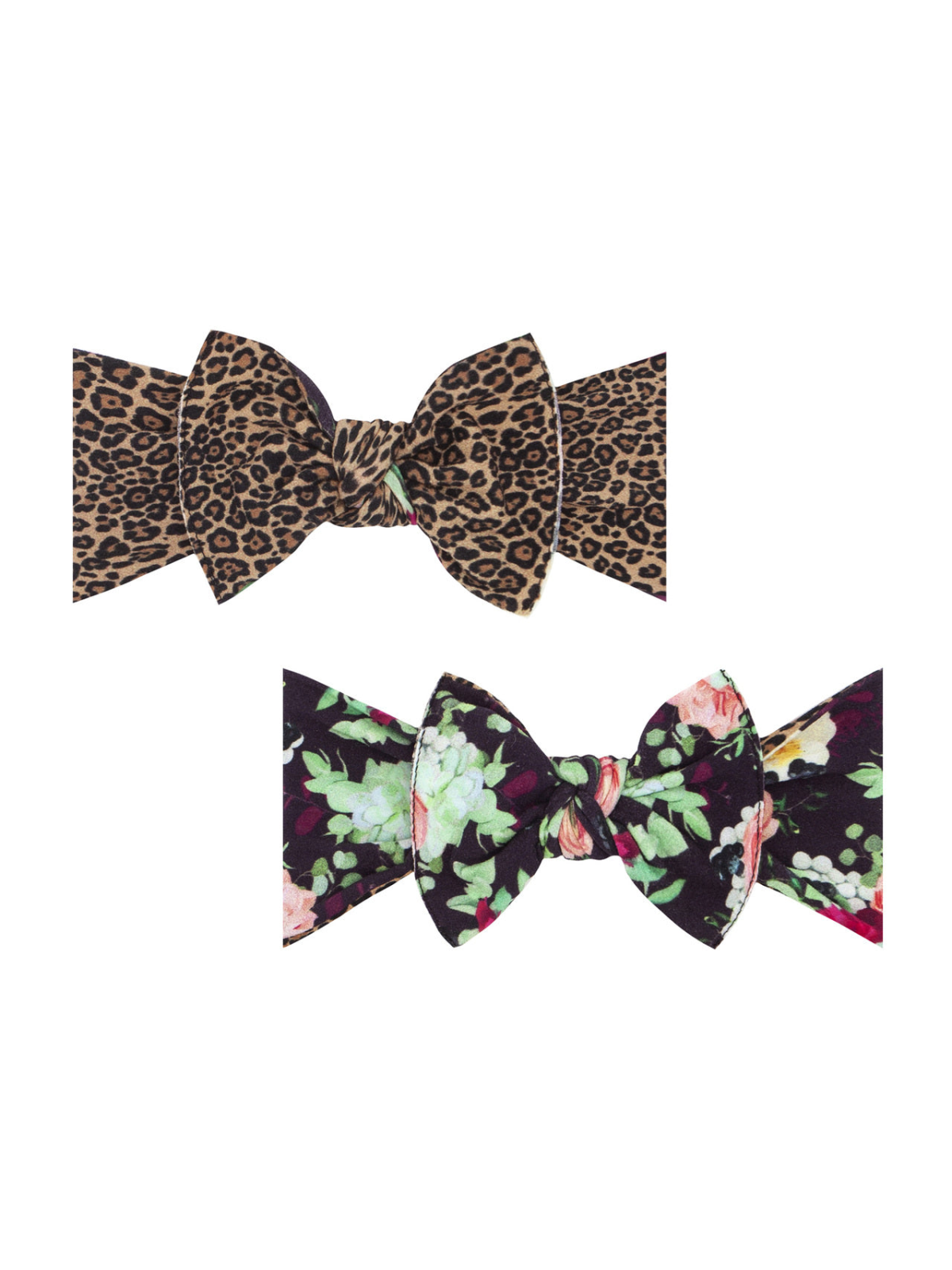 Two bow ties: one in a leopard print and another in a floral design on a dark background.
