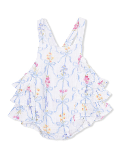 White baby romper with floral patterns and ruffled sleeves, perfect for warm weather.