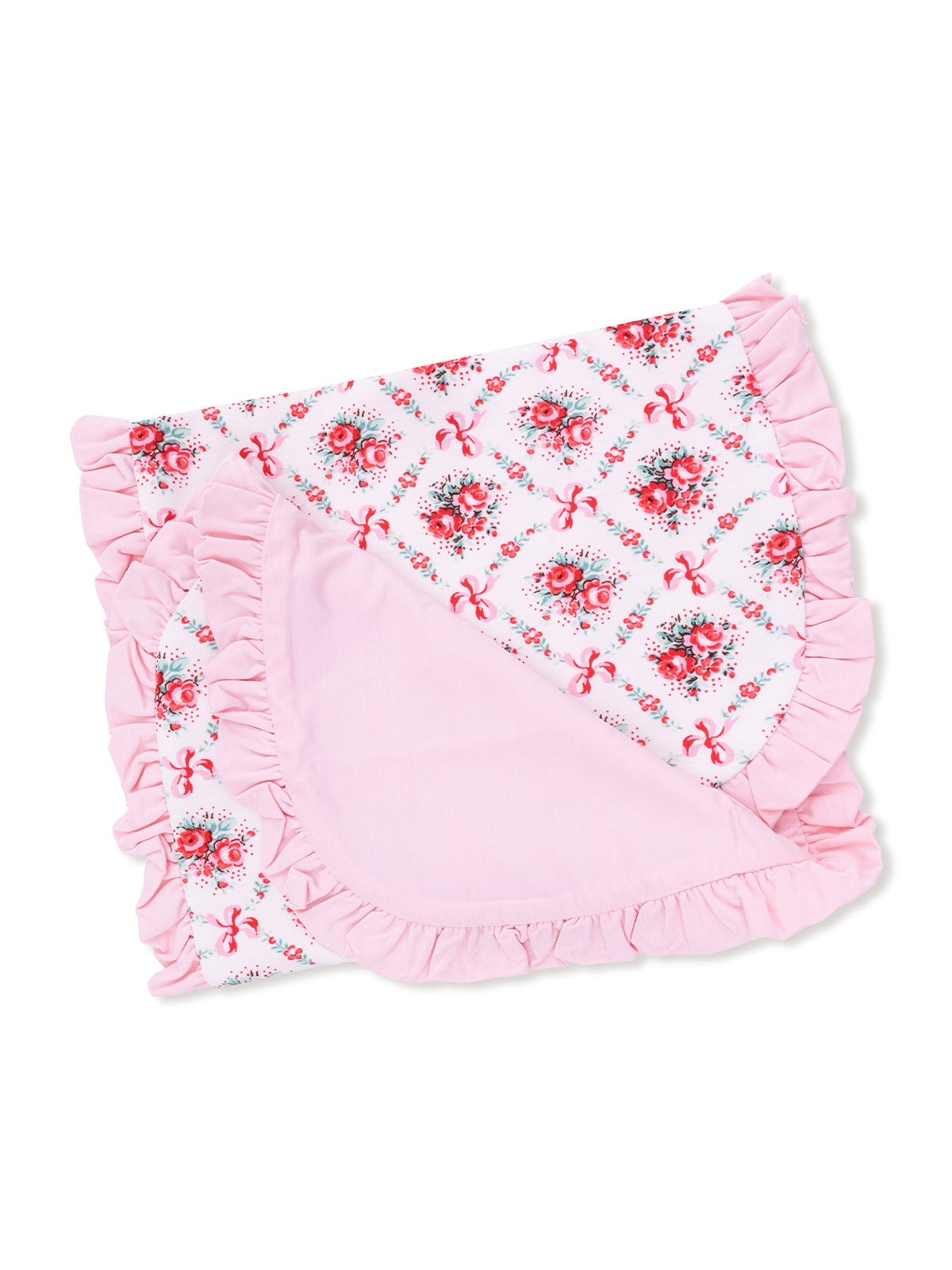 Pink floral quilt with ruffled edges, showcasing a charming pattern of roses and bows. Ideal for cozy decor.