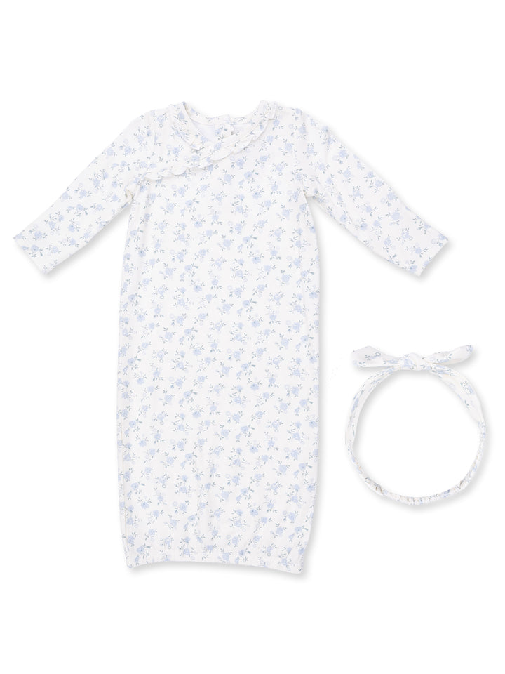 White floral baby gown with long sleeves, paired with a matching headband. Perfect for newborns.