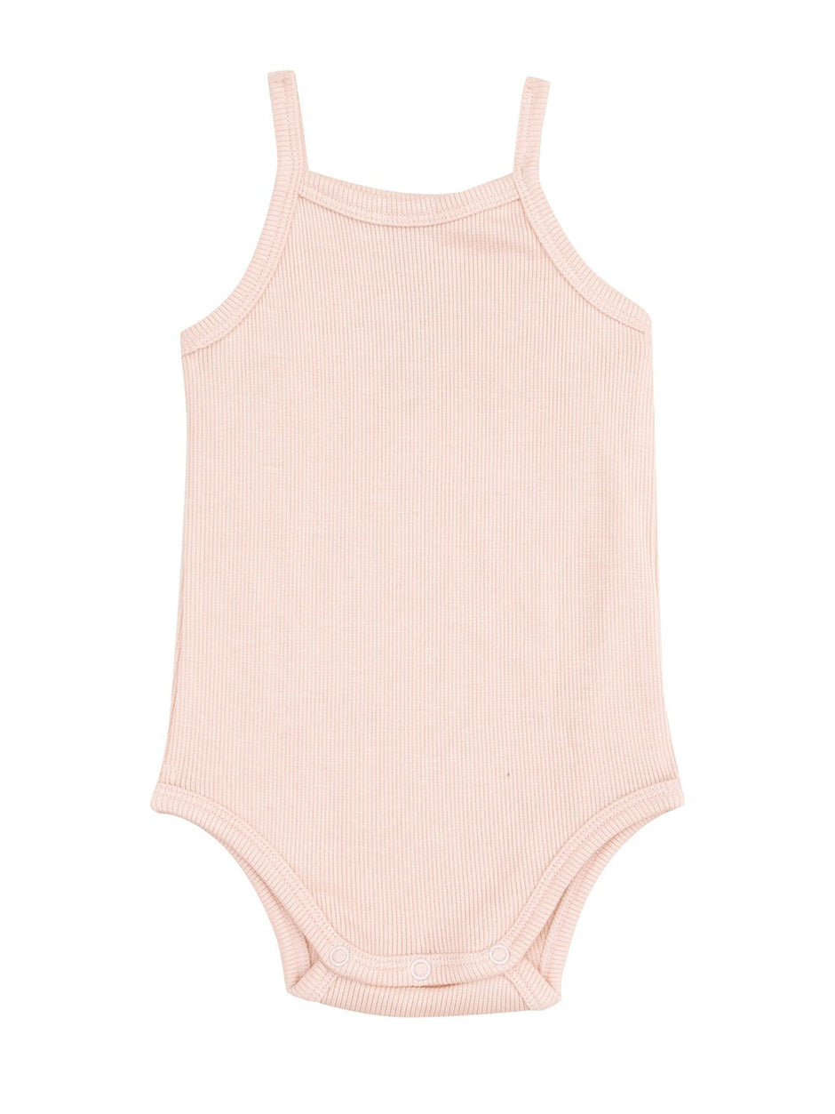 Light pink ribbed baby bodysuit with thin straps and snap closures at the bottom.