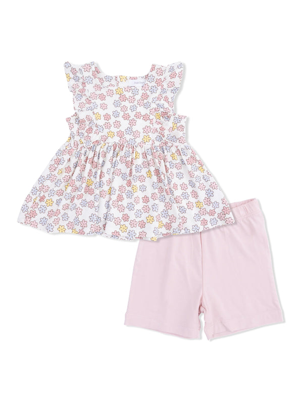 Floral top with ruffled sleeves and pink shorts for toddlers. Bright and colorful outfit suitable for warm weather.