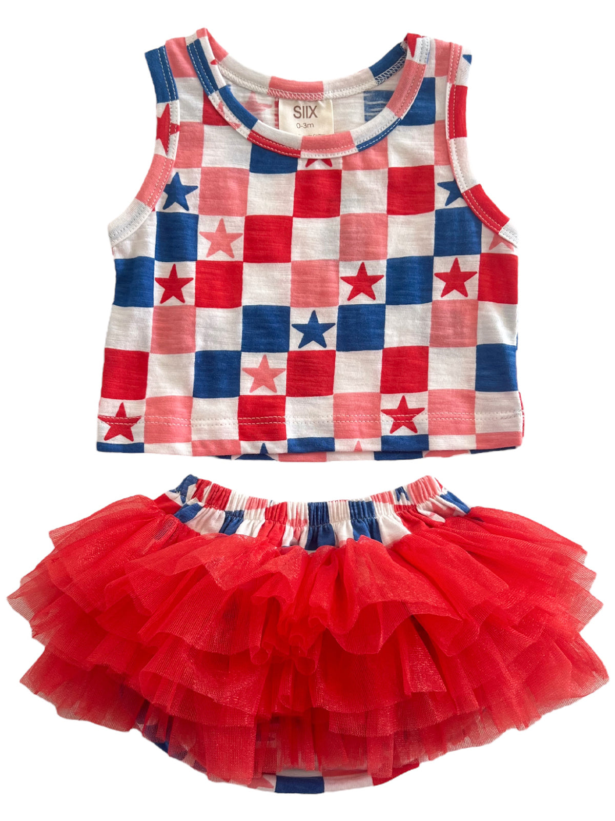 Red, white, and blue toddler outfit featuring a star-patterned crop top and a fluffy red tutu skirt.