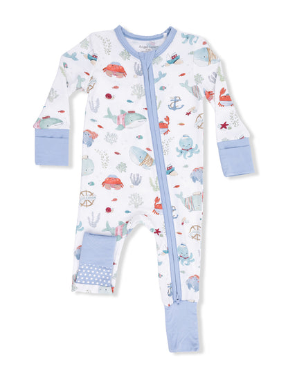 Baby ocean-themed pajama set with colorful sea creatures and a zipper, featuring blue sleeves and legs.