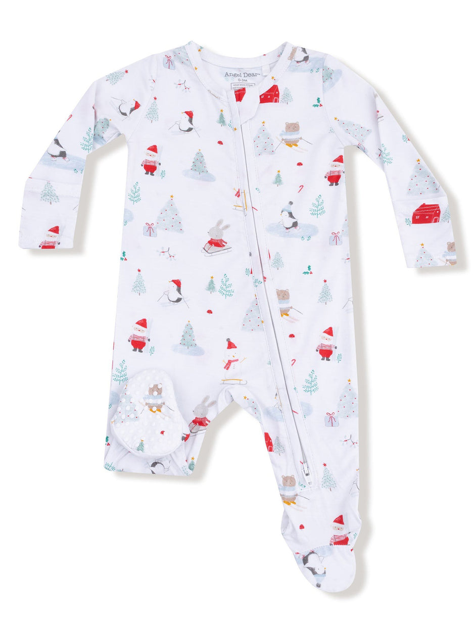 White footed pajamas featuring festive animal and holiday-themed prints, ideal for infants and toddlers.