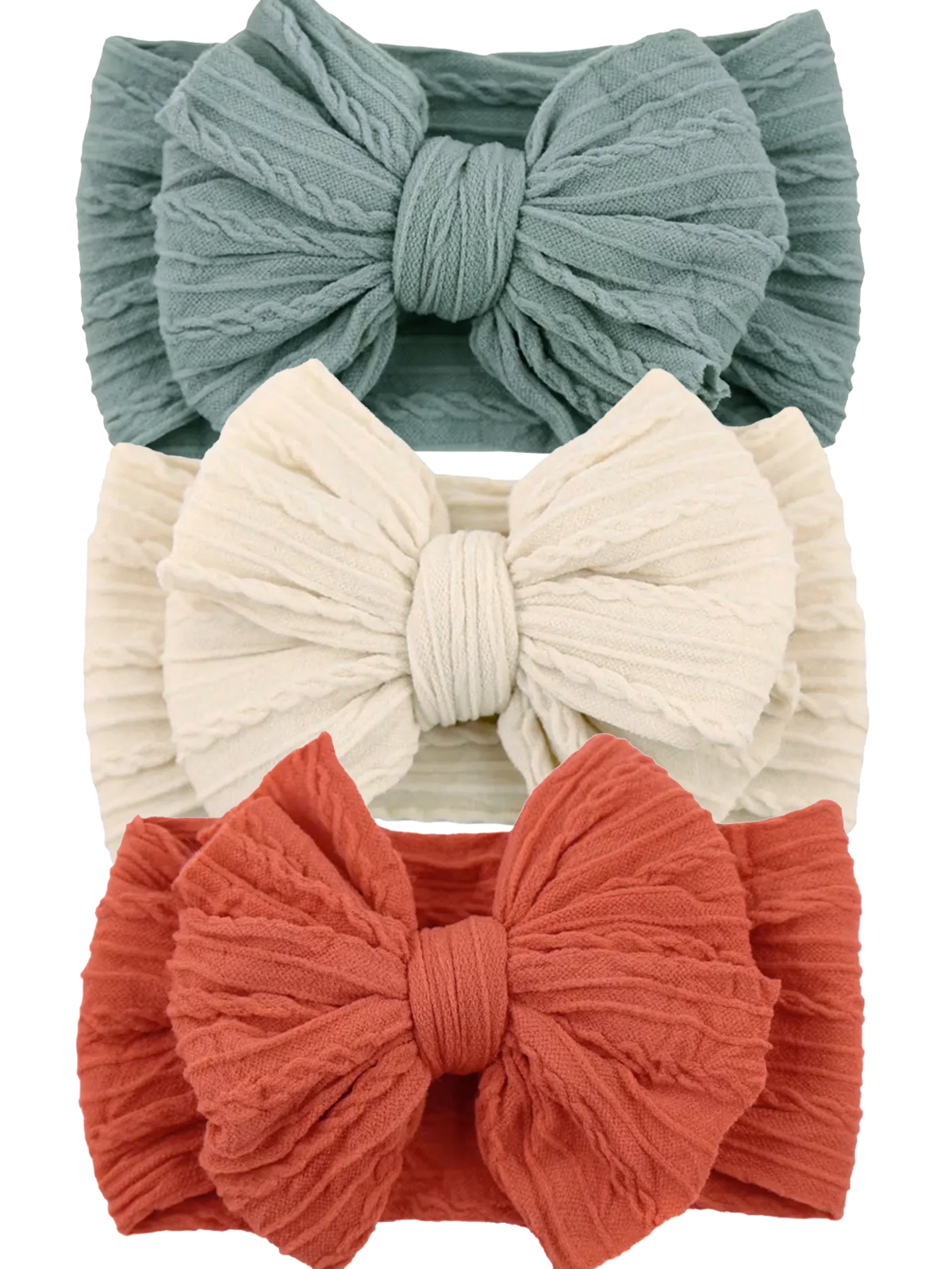 Three textured fabric headbands in teal, cream, and rust colors, featuring large bows.