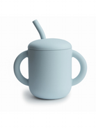 Light blue sippy cup with two handles and a straw, designed for easy drinking and child-friendly use.