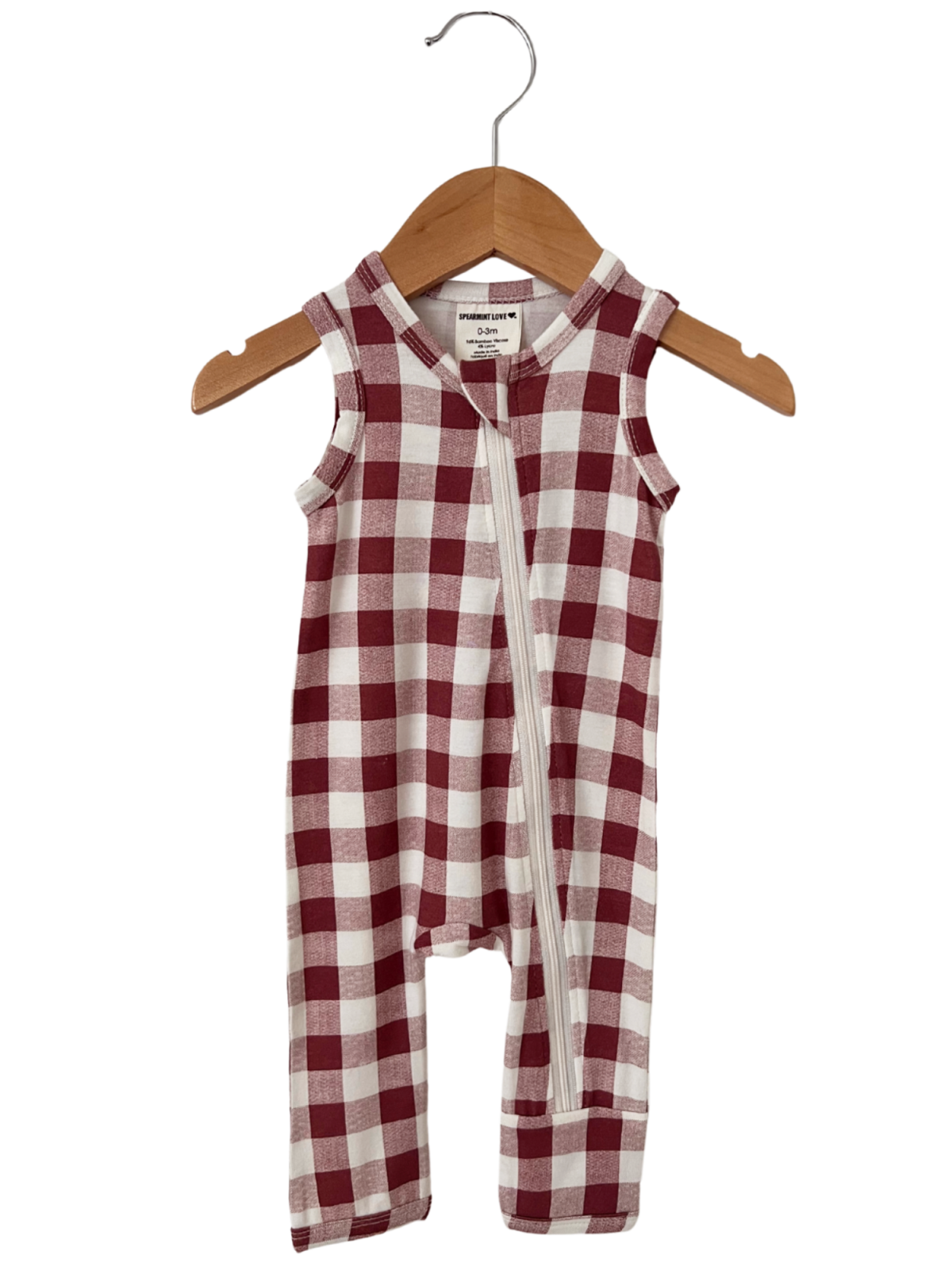 Red and white checkered baby romper on a wooden hanger. Ideal for infants aged 0-3 months.
